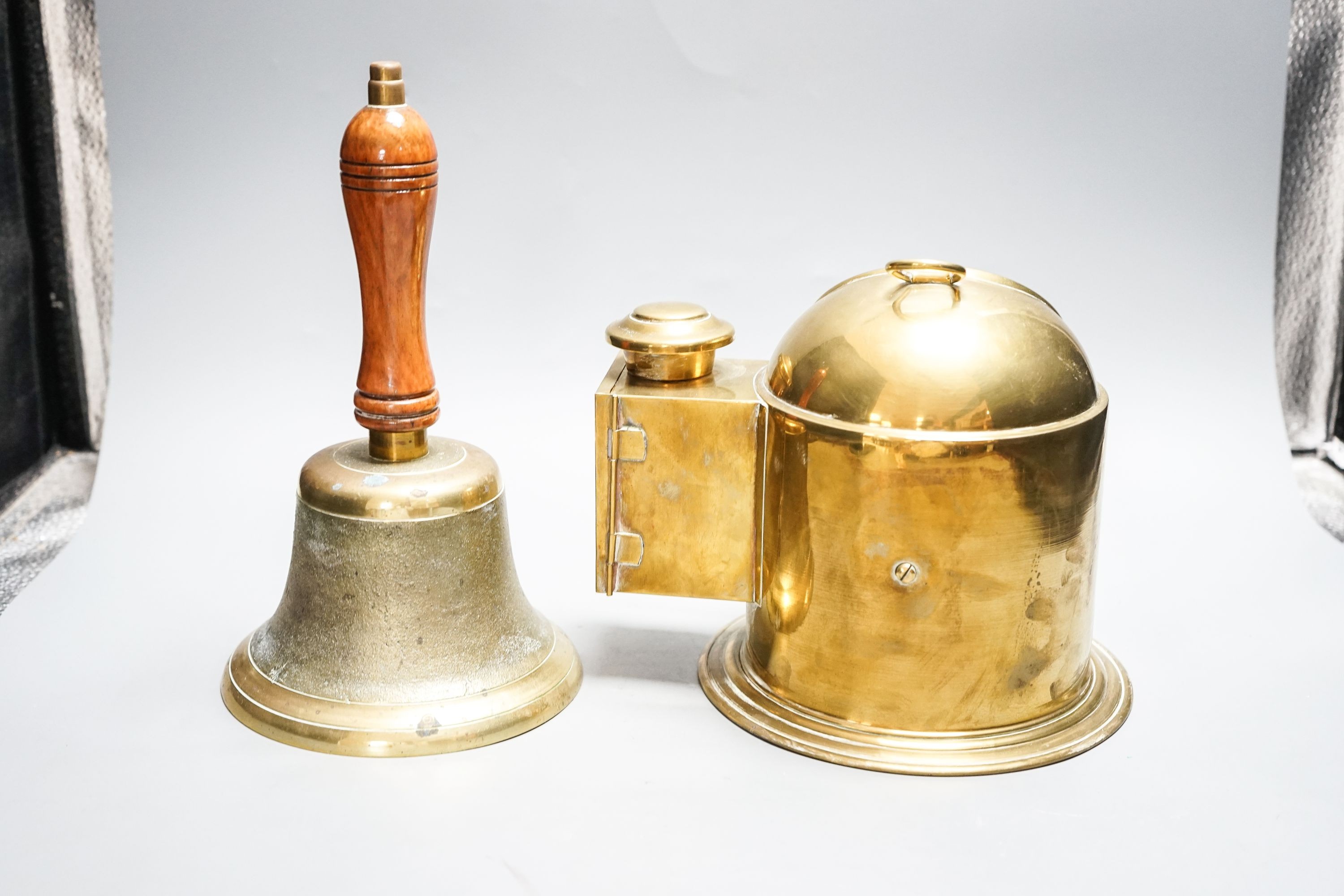 A brass ships binnacle compass and a handbell